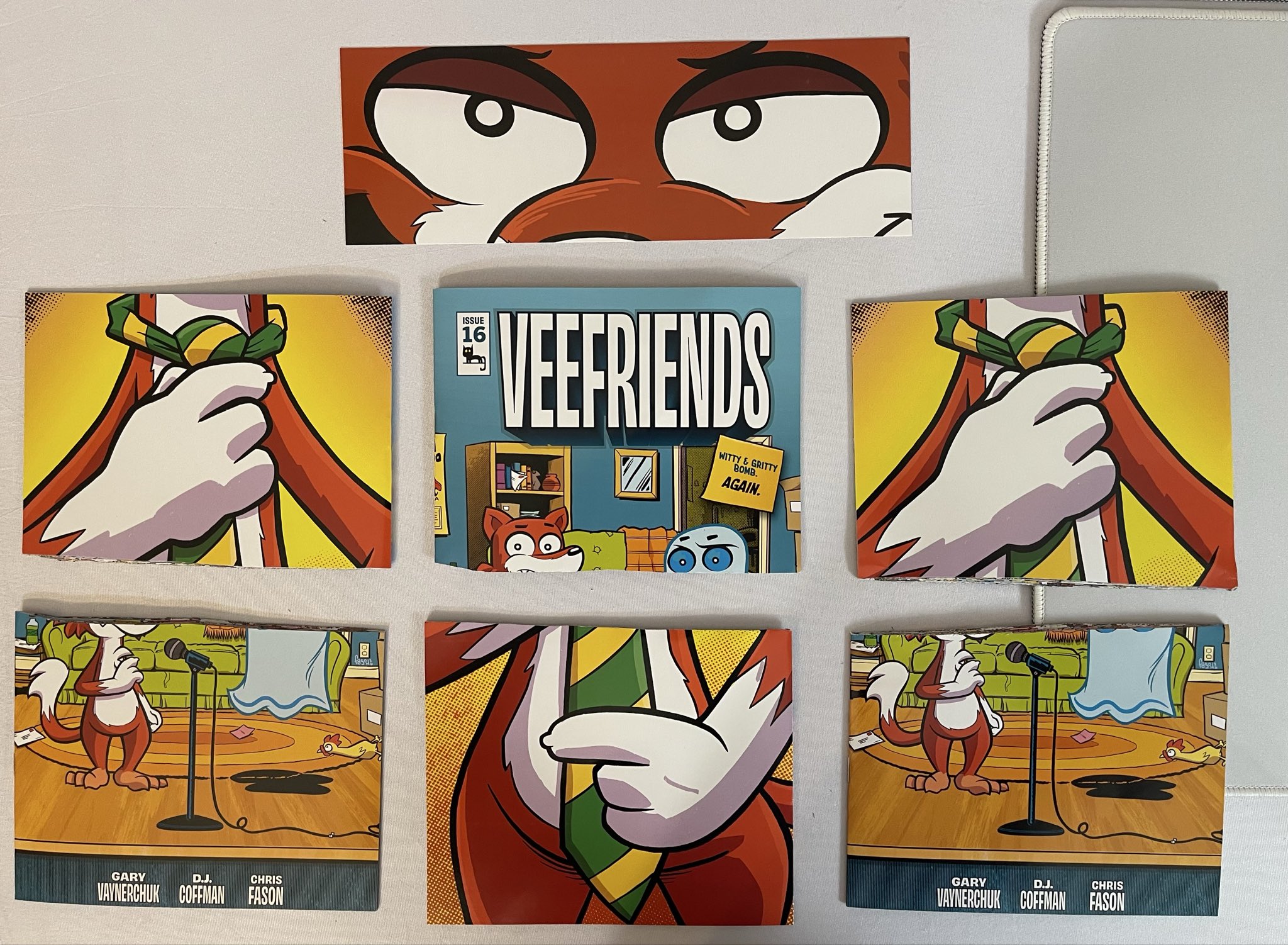 Three VeeFriends Issue 16 comics cut into pieces by JakeBreaksLive to unlock a Series 2 NFT