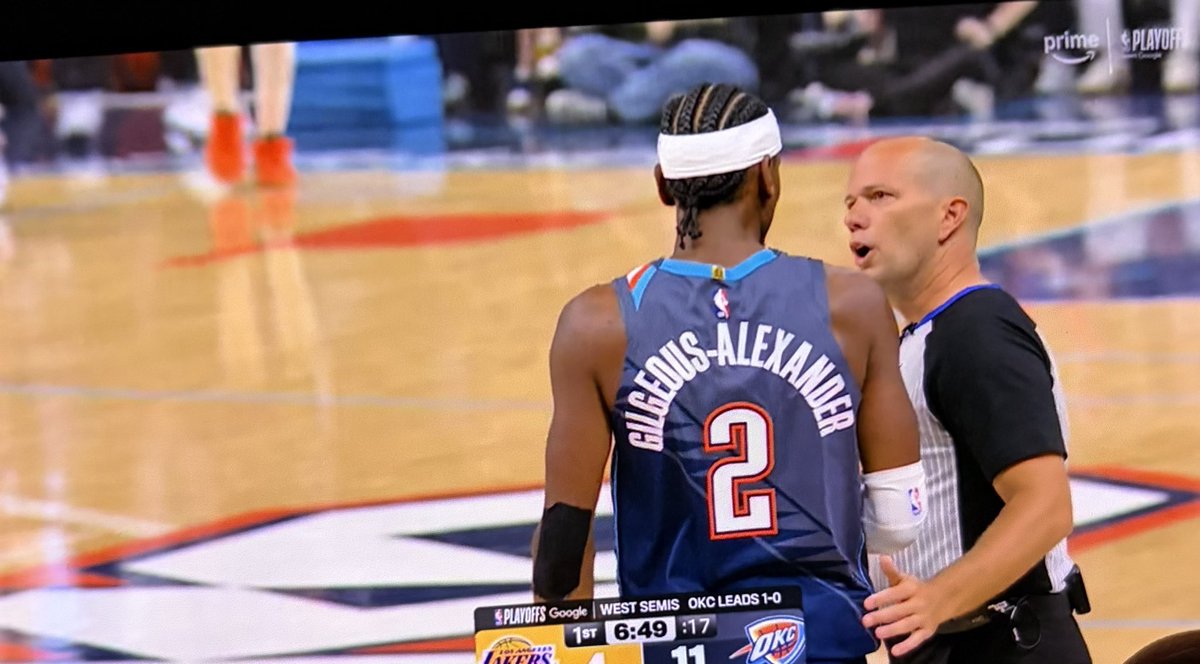 DoublePoint_s's tweet photo. Shai Gilgeous Alexander giving his House Elf, Dobby, instructions in game 2 of the western conference semifinals https://t.co/fUpN536JCv