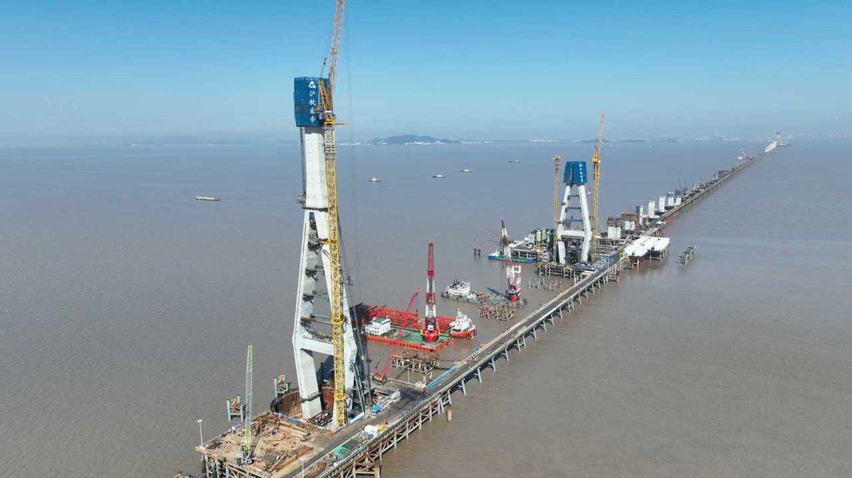 Off the coast of Ningbo, construction crews have completed the first main tower of the Hangzhou Bay Cross-Sea Railway Bridge — part of a 29.2-km high-speed rail link that will become the world's longest cross-sea railway bridge.