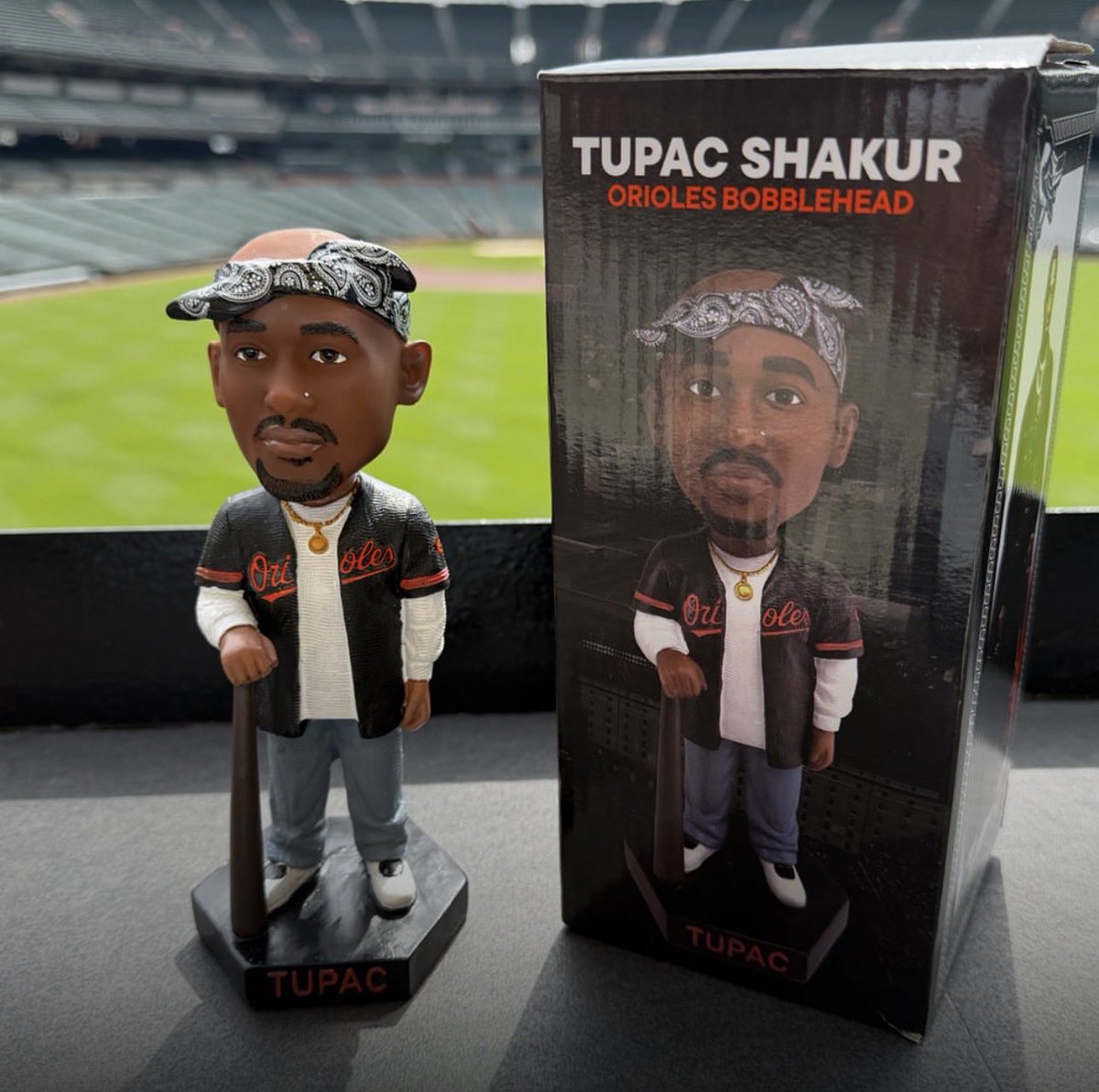 The first 20,000 fans at tonight's Orioles vs Athletics game will receive this Tupac bobblehead.