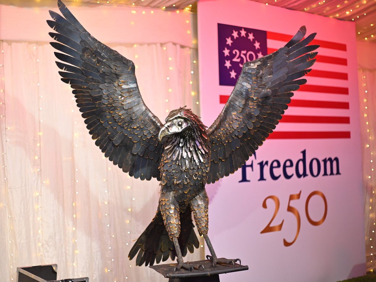 USEmbassyUganda's tweet photo. The 🇺🇸 bald eagle is flying high in Uganda! #AmbPopp and DCM Cleverley unveiled our #Freedom250 sculpture, crafted by 🇺🇸 IVLP alumnus @regnkan, symbolizing American freedom, strength, and resilience — the values that have defined the American spirit for 250 years. #Freedom250 | #MyAmericanEdge