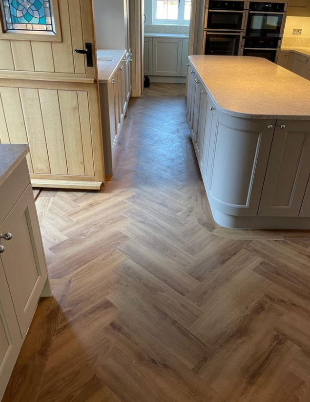 FurlongFlooring's tweet photo. Laguna Oak, but make it herringbone ✨

Our Aurora LVT brings authentic wood texture to life with embossed in register detail — so it looks as real as it feels.

Effortless elegance, every day 🤍

 #HerringboneFlooring #LVTFlooring #KitchenDesign #FlooringIdeas https://t.co/iZPCZtgona