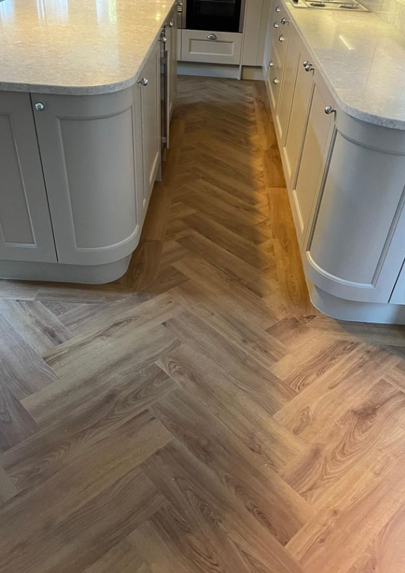 FurlongFlooring's tweet photo. Laguna Oak, but make it herringbone ✨

Our Aurora LVT brings authentic wood texture to life with embossed in register detail — so it looks as real as it feels.

Effortless elegance, every day 🤍

 #HerringboneFlooring #LVTFlooring #KitchenDesign #FlooringIdeas https://t.co/iZPCZtgona