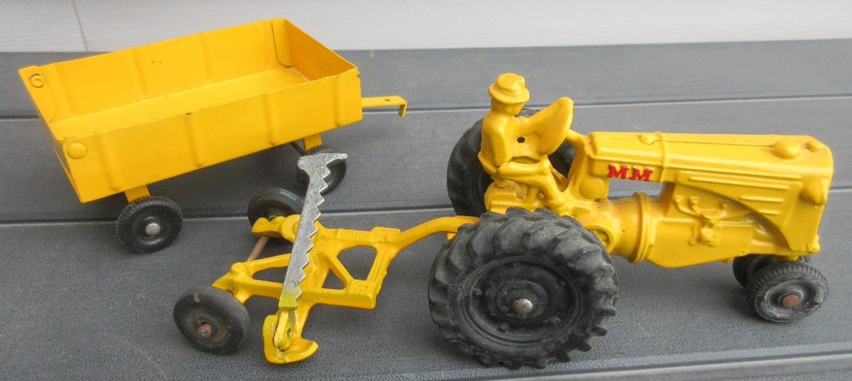 rusticrelics04's tweet photo. Vintage SLIK Minneapolis-Moline RTU Toy Tractor Sickle Mower ERTL Wagon 1/32 https://t.co/H6GpOnHXW4 #minneapolismoline #toytractor #vintagetoys #farmtoy #ertl #sliktoys #tractorcollector #diecast #farmtoys #rurallife #farmlife #tractorlife #agriculture #collectibletoys https://t.co/cv5ukNekzi