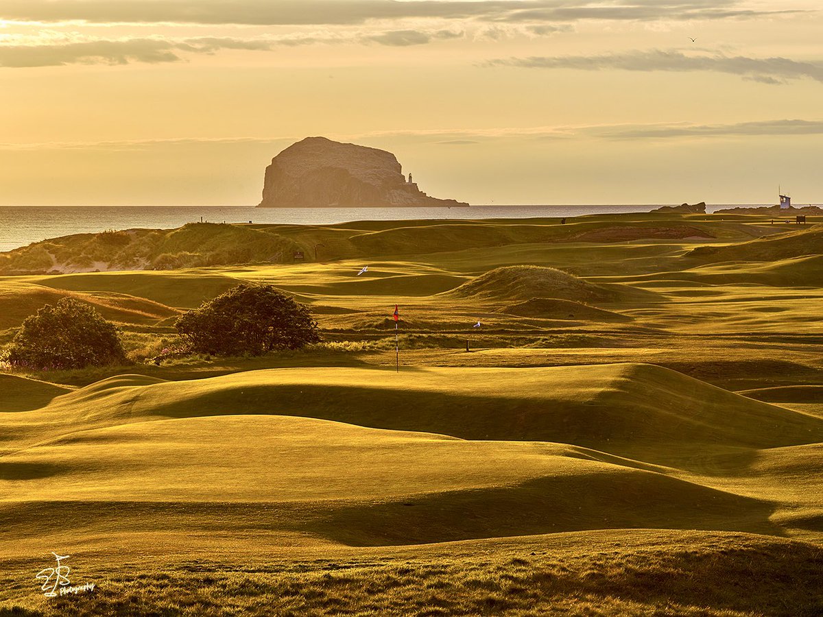 Evan_Schiller's tweet photo. After years of dreaming, I finally made it to @NorthBerwick_GC ..what a special place 😮😍👍. The 16th might be one of the great green complexes on the planet...sure looks amazing in that early morning sun. 📸Stay tuned, more pics to come as we are here for several days. https://t.co/sQer6ybNB1