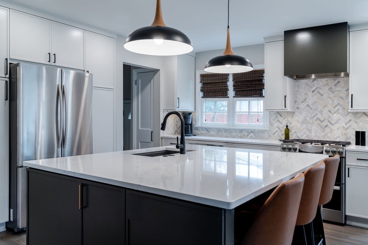 DreamMakerA2's tweet photo. This one came together exactly how we hoped. We removed two walls in this 1950s home to create a brighter, more open kitchen built for everyday living. Light perimeter cabinetry paired with a deep bronze island keeps the space feeling warm, balanced, and timeless. Clean... https://t.co/yUgZz2jsw1