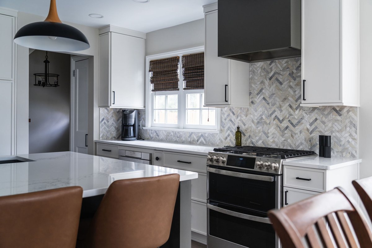 DreamMakerA2's tweet photo. This one came together exactly how we hoped. We removed two walls in this 1950s home to create a brighter, more open kitchen built for everyday living. Light perimeter cabinetry paired with a deep bronze island keeps the space feeling warm, balanced, and timeless. Clean... https://t.co/yUgZz2jsw1