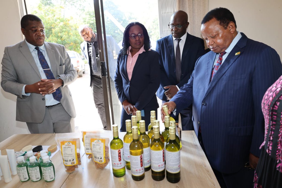 mhtestd's tweet photo. Minister of Higher and Tertiary Education Ambassador Dr. Frederick Shava being shown a range of products such as Mapfura Wine and Brand which have been commercialised and now on the market at the National Biotechnology Authority offices in Newlands, Harare. https://t.co/zKWjhnijzY