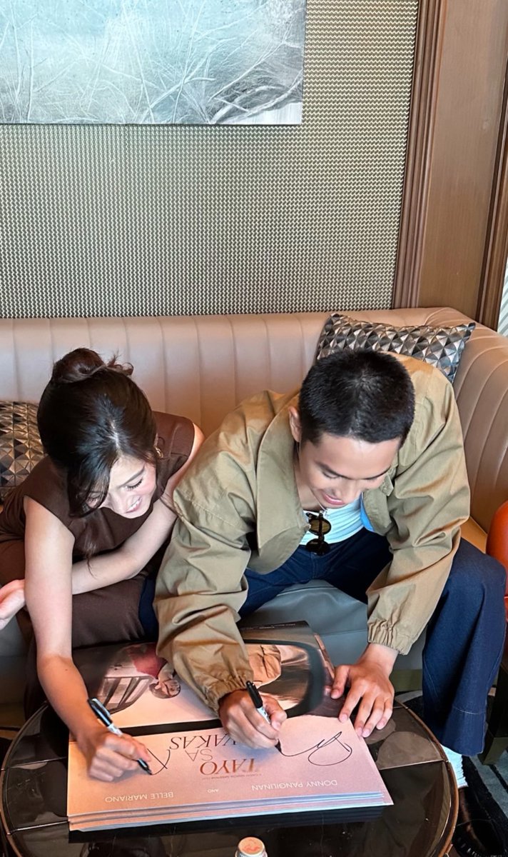 Signing posters 

DONBELLE HANGGANG WAKAS 

#TSWSoundtrackLaunch