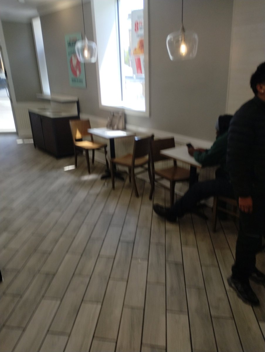 Ian_socool's tweet photo. @kfc Your restaurant at Myrtle and Palmetto in Bushwick Brooklyn. The hanging lights are too close to the table and people hit their heads on it when getting up. Do something before someone gets seriously hurt. https://t.co/zbzoF5cOJI