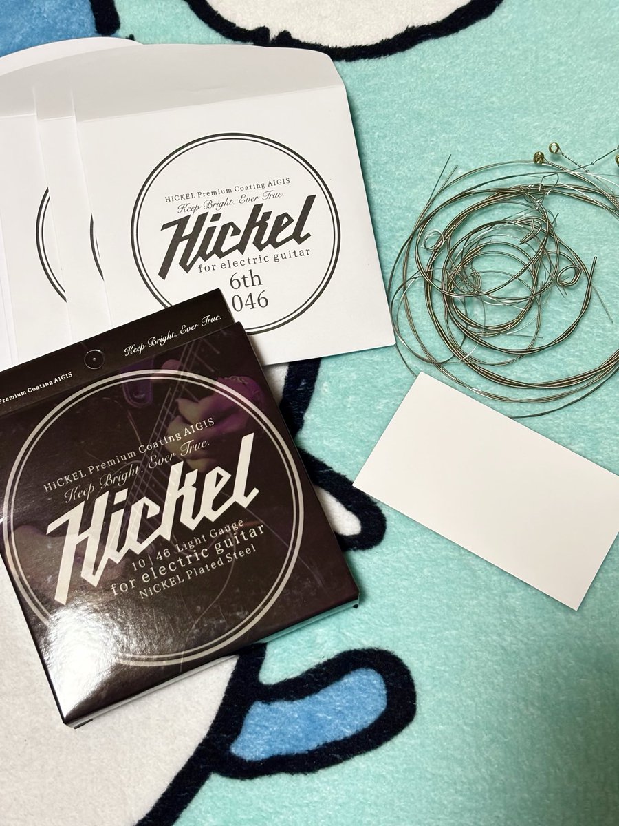 2maimaN7's tweet photo. 初コーティングギター弦
HiCKELのAIGIS装備完了🛡️🎸
ツルツル過ぎなくて良い✨
パッケージ表も裏もカッコイイ✨ https://t.co/6SOWhlX0FF