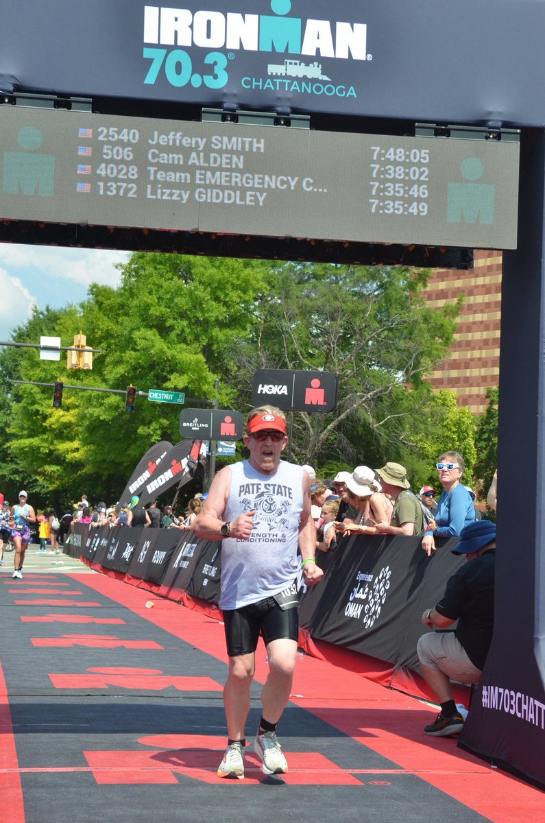 MightyMick2013's tweet photo. @JoshPateCFB Hey Josh!  I tweeted about this once before.  My name is Mick Hodgins and I am such a fan of the show that I ran the run leg of the Chattanooga 70.3 Ironman in a Pate State Strength and conditioning T shirt.  see Pic!  Is this worthy of a Chalice?? https://t.co/uqspcfP2Gt