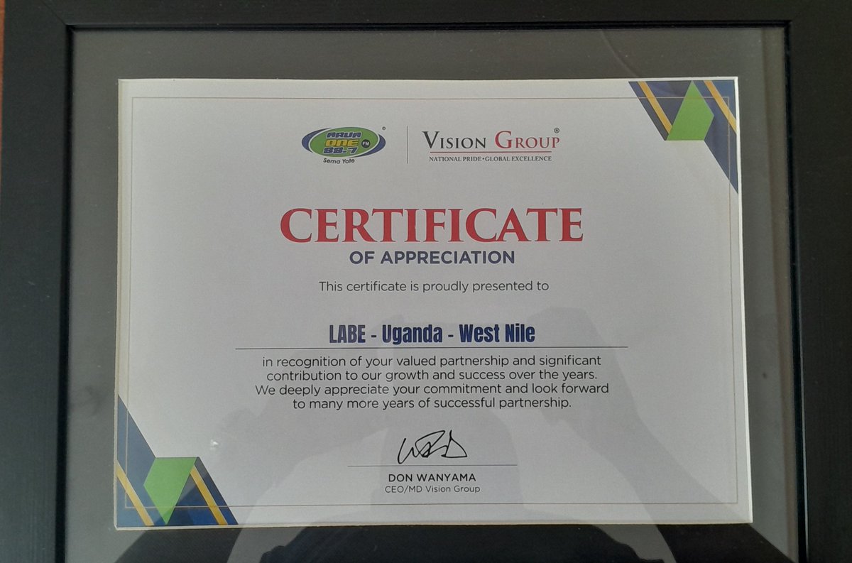 LABE_UG's tweet photo. 📻 A teacher at the mic. Families tuned in. One story bringing them together.

Our Live Shared Book Reading program put teachers on local radio, reading HLC storybooks live on air, while families gathered at the library to listen and respond in real time.

Last week, Vision Group recognised their partnership with LABE and highlighted this program as one causing real impact. Partnerships like this are what make our work possible.

#LABEUganda #WestNile #LiteracyMatters #VisionGroup