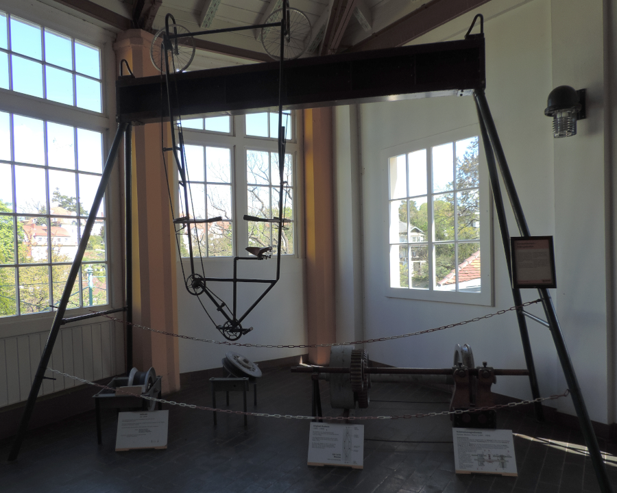 krokosh's tweet photo. This looks like one for @TheTimTraveller : the Standseilbahn at Dresden has a danglebike on display in the upper station https://t.co/iM4KxxjlOA