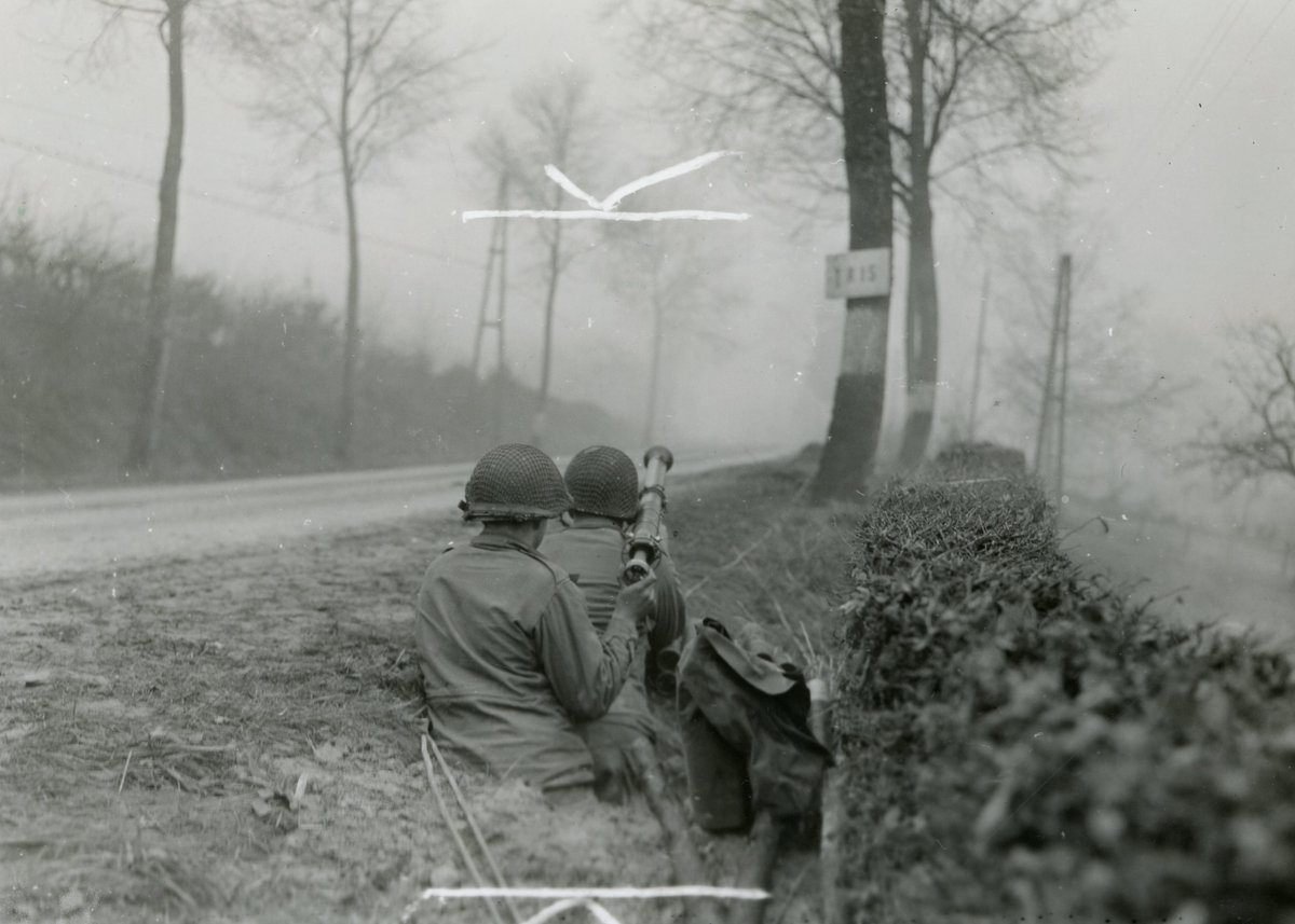POVWW2's tweet photo. Are you ready for what’s coming down that road?

Hear what happened when Arthur Goldschmidt’s bazooka team faced three Tiger tanks on the POV:WW2 podcast: https://t.co/AErc8vAVoj #WWII #HistoryPodcast 

About the photo: https://t.co/feP20z2a7w https://t.co/vtlP4SJwfZ