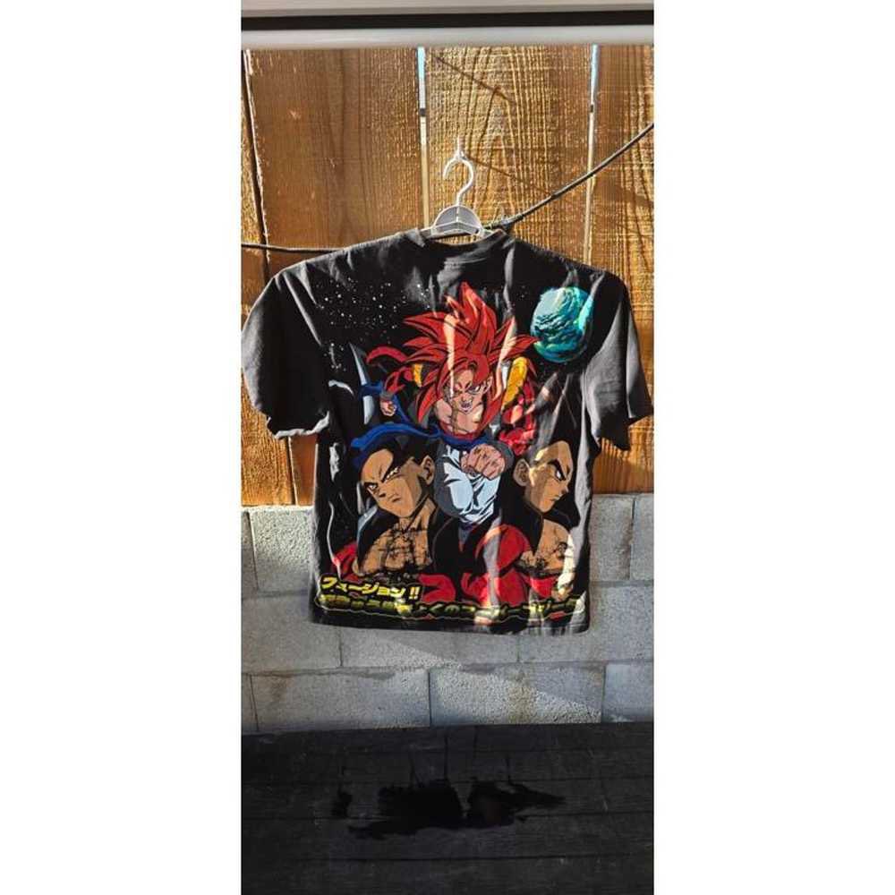 DrawnByCB's tweet photo. They don’t make dragon ball mech like they used to those old GT shirts would go harder than Essentials rn on broo 😭 https://t.co/PpOKFOGXoh