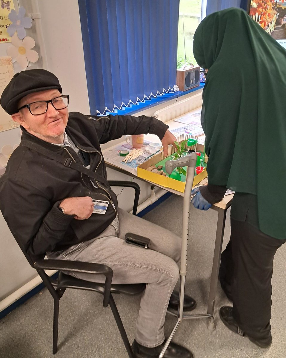 HeadwayBS's tweet photo. This is Headway House client Lee, enjoying 1:1 support from one of our FAB volunteers taking part in a creative session making a garden.  At the same time as being a therapeutic activity, it is also working on cognitive skill and hand eye co-ordination.
#volunteering #Braininjury https://t.co/W2F5FzS3bM