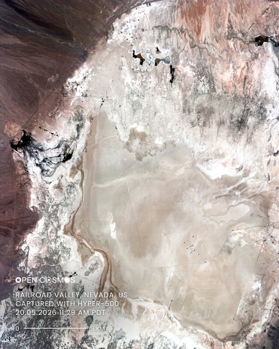 Open_Cosmos's tweet photo. This week’s #ImageOfTheWeek takes us to Railroad Valley, Nevada - the prime location for satellite calibration on Earth.

Out of the small handful of elite global calibration sites, Railroad Valley is the most consistent. Its isolation and stable weather patterns provide a near-constant environment that rarely changes, making it a world-class reference point for the space industry and a core member of RadCalNet (The Radiometric Calibration Network).

The dry lakebed’s extreme flatness and uniform surface provide the perfect "ground truth" for our sensors. We leverage these unique conditions to run automated radiometric campaigns - linking our measurements to SI-traceable ground data while carefully managing the uncertainty budgets of our Top of Atmosphere (TOA) observations.

This ensures our instruments stay perfectly tuned and our data remains consistent, accurate, and reliable across our entire constellation.

#OpenCosmos #EarthObservation #SatelliteData #RadCalNet #Calibration