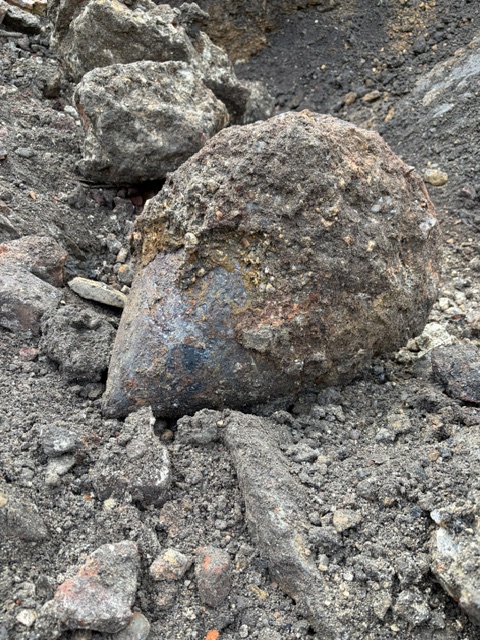 6_Alpha's tweet photo. During a 6 Alpha watching brief on a client site, a nose cone from a 500 kg kilogram bomb was discovered.  It was immediately assessed by our on-site explosive ordnance disposal engineer. For UXO service provision of this sort, contact us directly at https://t.co/cqs3dDXWT4. https://t.co/buF6AdEong