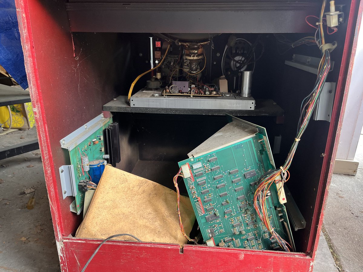RetroGamer_Meph's tweet photo. Drilled out the locks and got both back panels open.  This is what I found first thing.  Board wasn't secured and was just flopping around in there.  The interlock was off so I checked all the connectors, flipped on the interlock and we had power! https://t.co/6YnewIy5y7