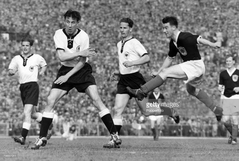 davstu11's tweet photo. OTD in 1957 the legendary Tommy Ring of Clyde here in action against West Germany in Stuttgart with Sammy Baird of Rangers in the background. Scotland stunned the crowd of 80,000, winning 3-1 with two goals from Bobby Collins of Celtic and one from Jackie Mudie of Blackpool. https://t.co/k3e2h1WC1l
