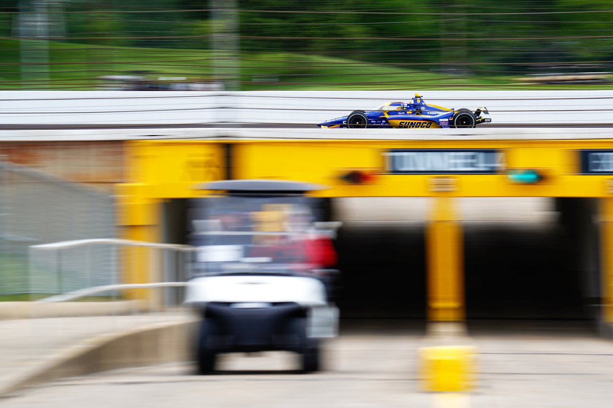 KevinDMotors's tweet photo. My favorite photo of Carb Day is Kyffin Simpson driving over the tunnel on the back straight. Grass in the background, a golf cart in the tunnel, but still cruising past at 225+ MPH.

#IndyCar #Indy500 https://t.co/KNepMRGYC9