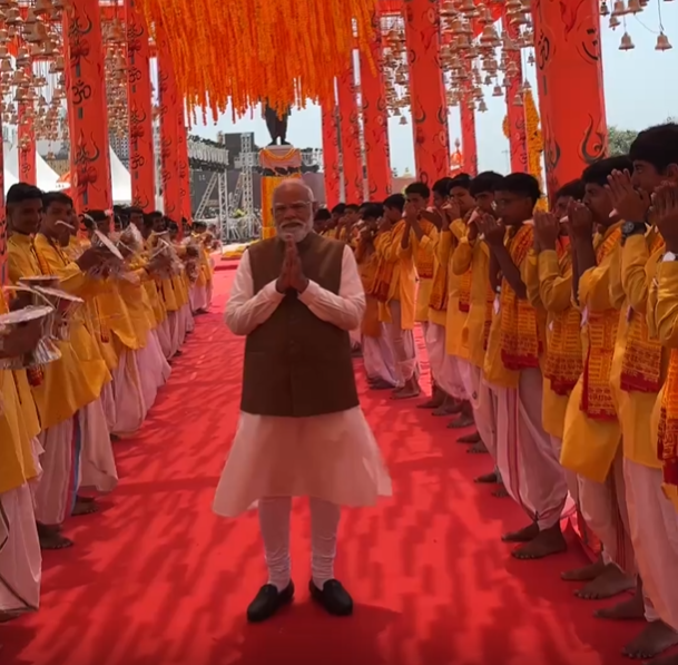Dear Hindu

PM Wear shoes inside the temple Except him no one else is in Shoes.

Is shoes allowed in our Temple ????? 

i also visited somnath recently and as far as i know no one is allowed to wear shoes from the entry gate of temple.

Ye kaisi dharm ki raksha hai jaha dharm ke