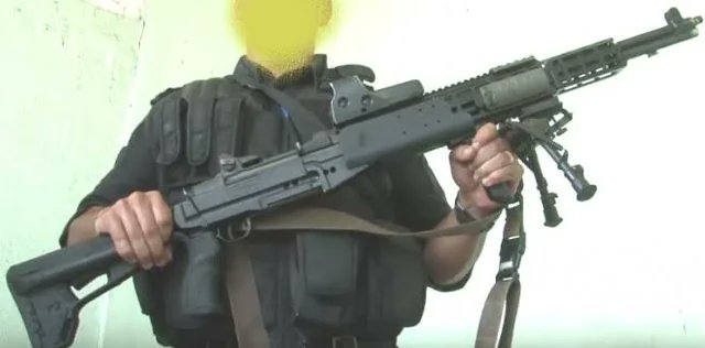 Brazilian Police with a confiscated M1 Garand heavily modified and modernized.