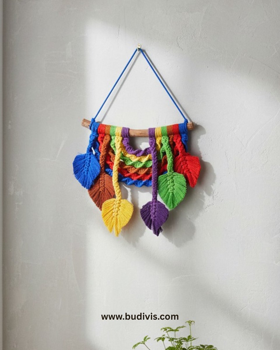 budivis's tweet photo. Colorful handmade macrame wall hanging with leaf tassels and woven cotton details. A cheerful statement piece for boho and creative interiors. 🌈
#MacrameDecor #BohoStyle #WallHanging #HandmadeArt https://t.co/zmybYnd9eS