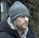 Toronto Police are seeking a suspect in the knocking down of a menorah in front of a Jewish community center on April 10, causing damage.