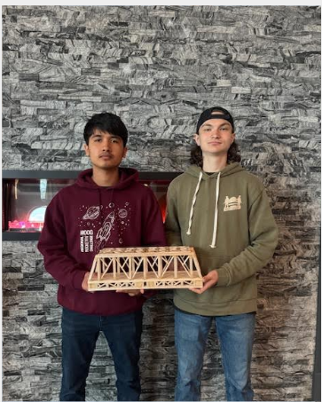CheektowagaCSD's tweet photo. Engineering Design students competed in the ABCD WNY Balsa Wood Bridge Competition against 150+ bridges from 9 WNY schools. One team earned a top-10 finish, placing 8th with near perfect scores in complexity and workmanship while holding 175 pounds. Great job, everyone! https://t.co/ZSwezX70lT