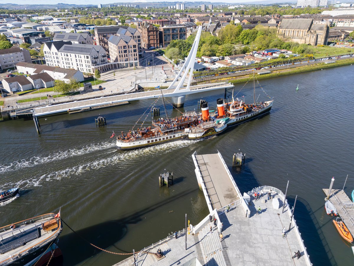 KB_Photos07's tweet photo. Drone images of the PS Waverley sailing through the opened Govan-Partick bridge yesterday morning as part of the Glasgow &amp; Clyde Coast Spring Cruises 2026

@PS_Waverley @Glasgow_Live @Glasgow_Times 
#Waverley #WaverleyPS  #riverclyde #govantopartickbridge https://t.co/vZSItu5l6c