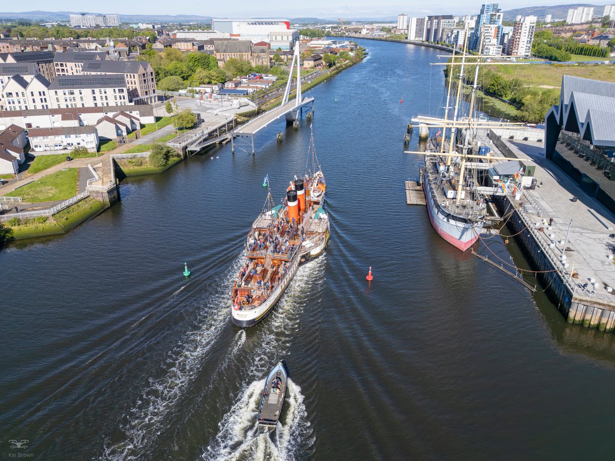 KB_Photos07's tweet photo. Drone images of the PS Waverley sailing through the opened Govan-Partick bridge yesterday morning as part of the Glasgow &amp; Clyde Coast Spring Cruises 2026

@PS_Waverley @Glasgow_Live @Glasgow_Times 
#Waverley #WaverleyPS  #riverclyde #govantopartickbridge https://t.co/vZSItu5l6c