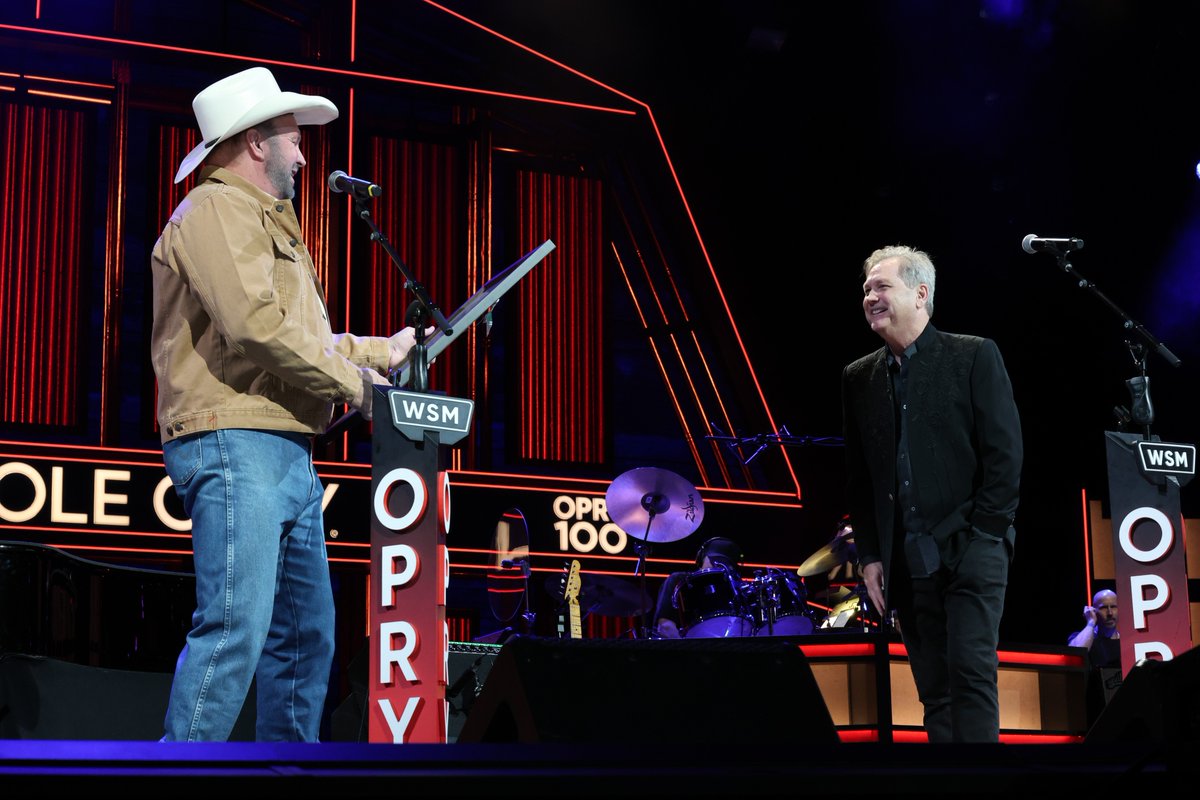 opry's tweet photo. Opry star @stevewariner's official 30th anniversary is today, and we're still beaming from Saturday! Happy 30th anniversary, Steve! 

Fellow Opry member @garthbrooks stopped by and surprised Steve with his commemorative poster recognizing his 30-year Opry membership. https://t.co/5rAAP2gbOK