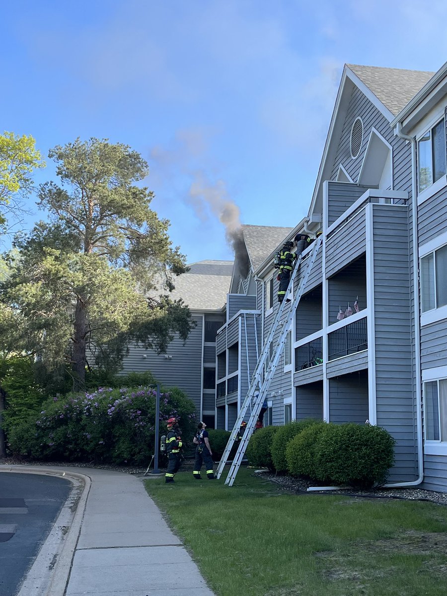 BFD_MN's tweet photo. The fire is out and crews are starting to pick up. The fire was contained to the 3rd floor and parts of the attic.  Several occupants had to be rescued from balconies. We are in the process of evaluating if the building can be reoccupied. https://t.co/KyXFvPHh4Q