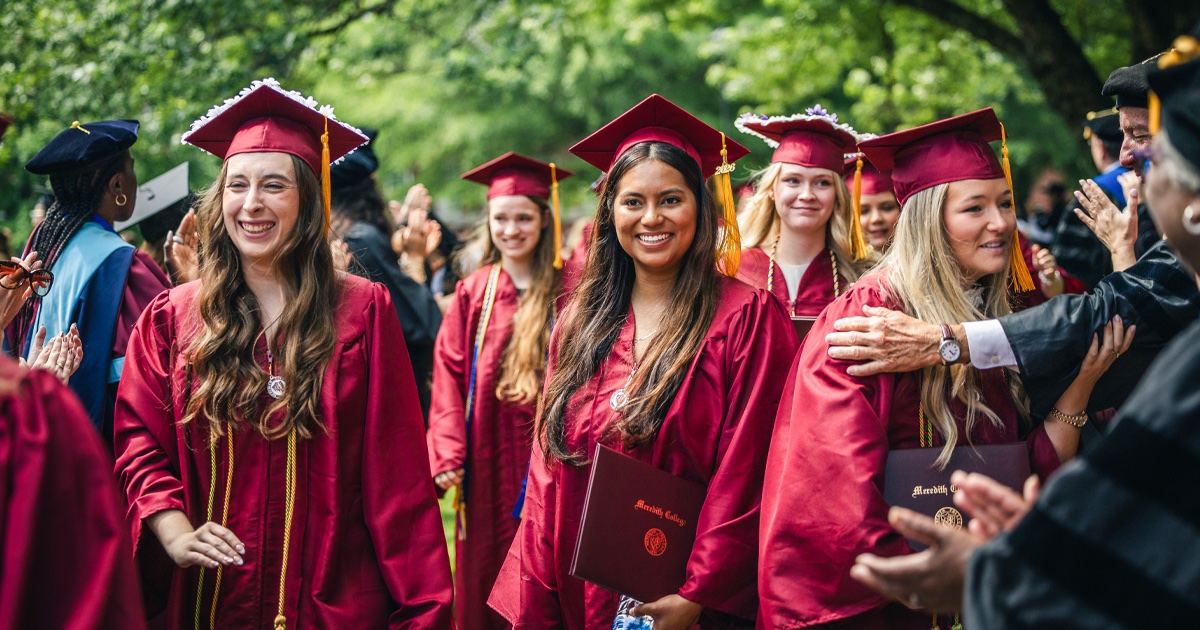 MeredithCollege's tweet photo. On Saturday, May 9, through a little rain and sun, Meredith conferred nearly 400 degrees with the celebration of our undergraduate and graduate candidates.

Learn more about the celebration: https://t.co/3kyJXEW9kl https://t.co/ENTSiVhjdd