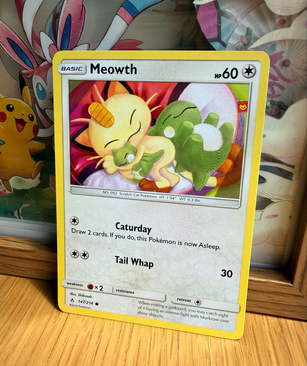 underrated meowth card that has a creepy pikachu face hidden in it