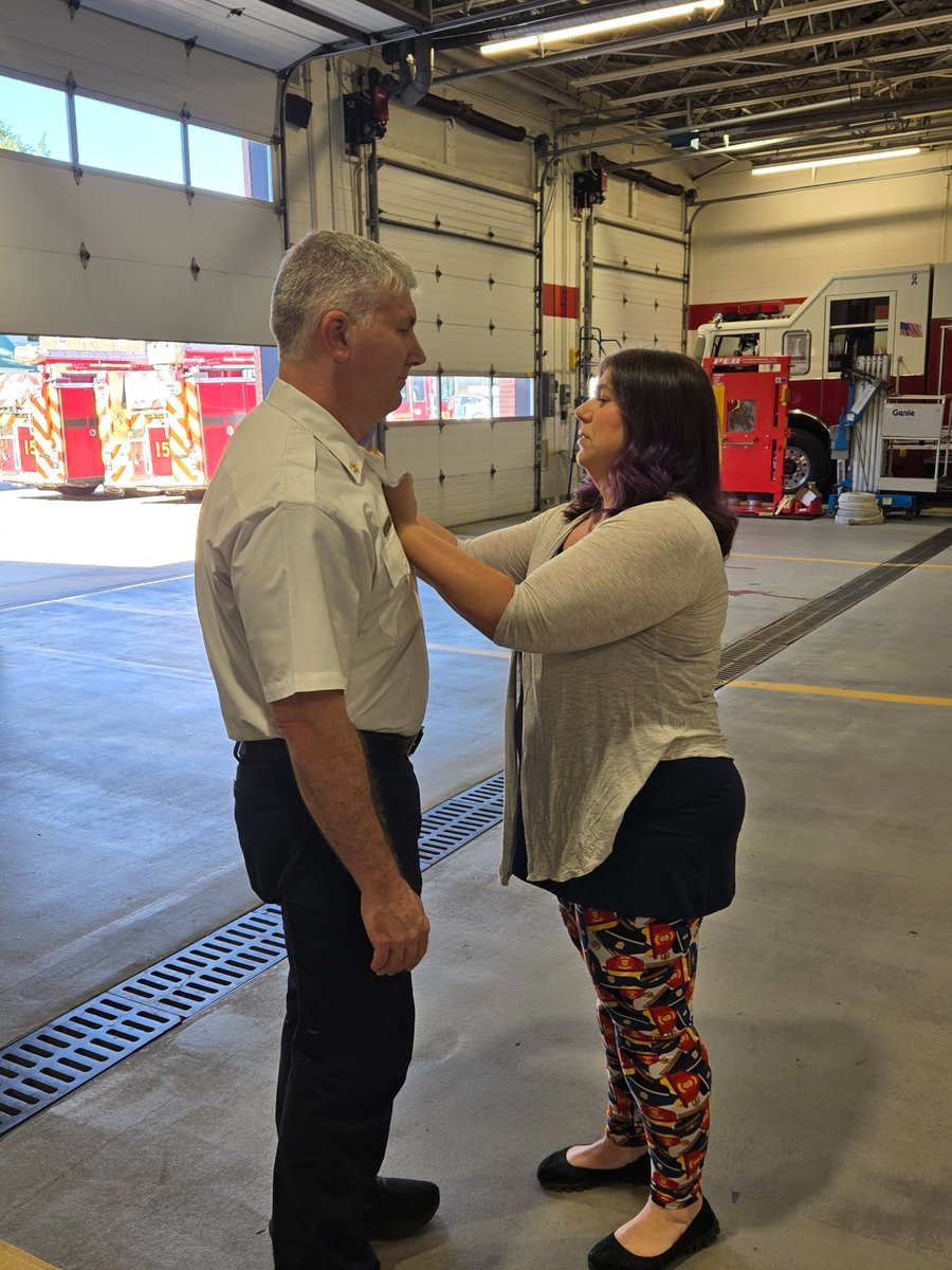 ChampaignFire's tweet photo. Here are a few photos from today's badge pinning of Deputy Chief Chris Zaremba.  Deputy Chief Zaremba had his badge pinned on by his wife and was joined by family.  Congratulations! https://t.co/QzOiWl5Ka9