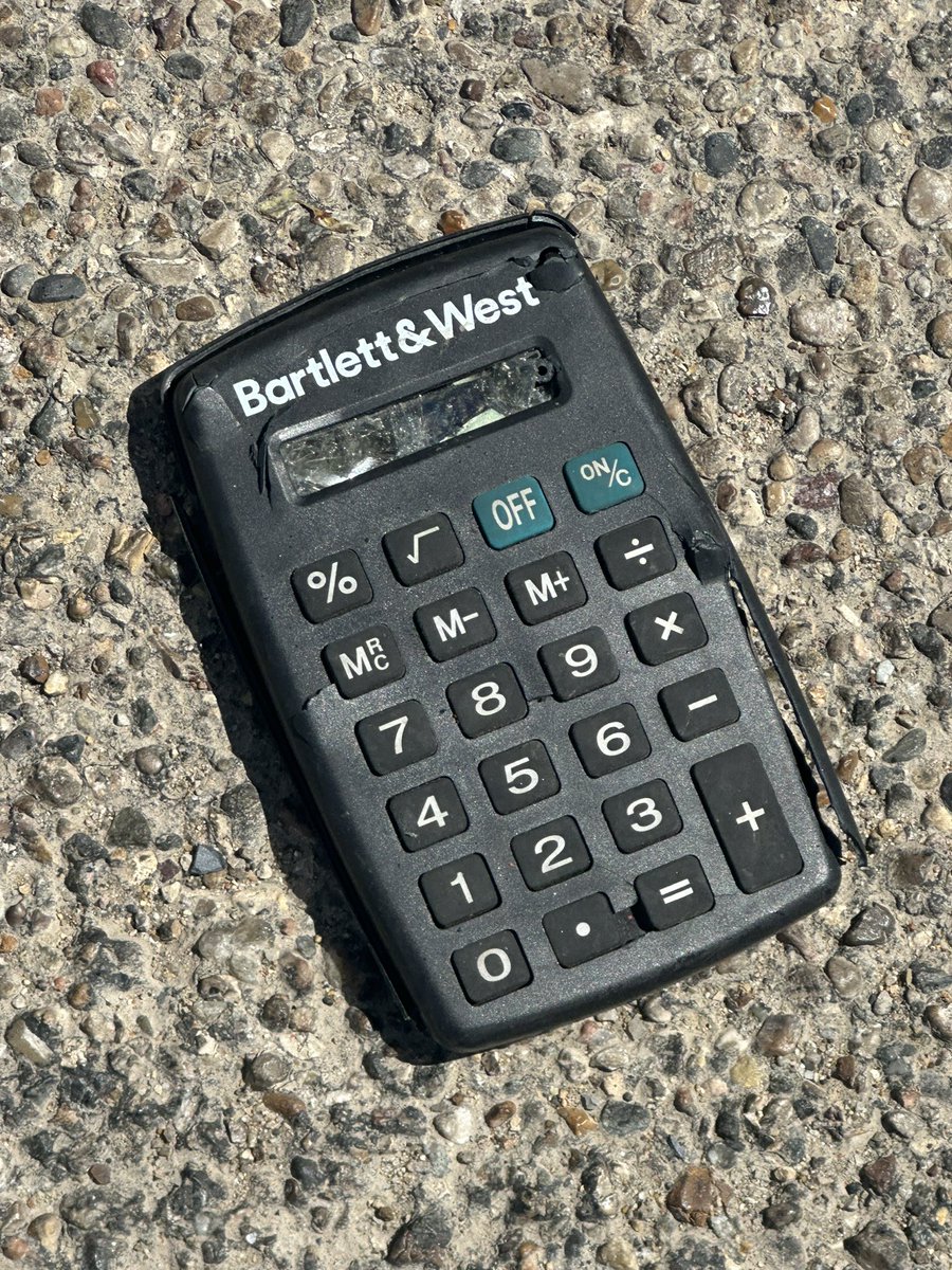 THE563's tweet photo. FOUND: Bartlett and West calculator, shattered. Probably doesn’t work. But maybe  service award gift? Located on street on 600 block of B Mandan St. #BismarckLostandFound https://t.co/QlvhMFlqdy