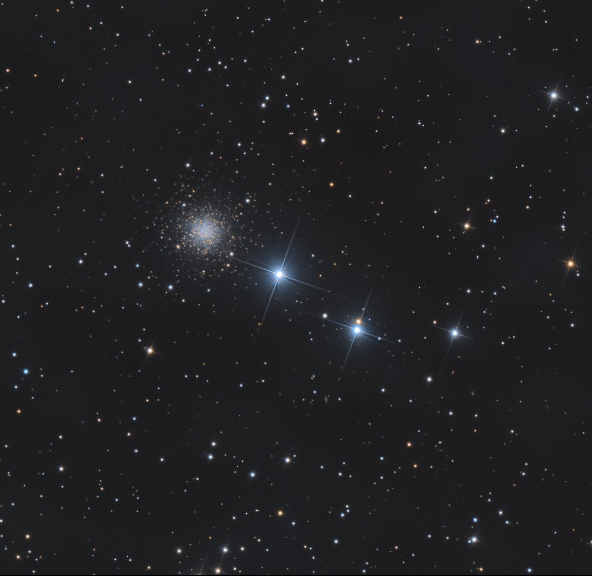 My latest - the globular cluster NGC 2419.  It has the nickname "the Intergalactic Wanderer." It was erroneously thought not to be in orbit around the Milky Way.  It's roughly 275,000 to 300,000 light-years away and takes 3 billion years to complete one orbit around our galaxy.