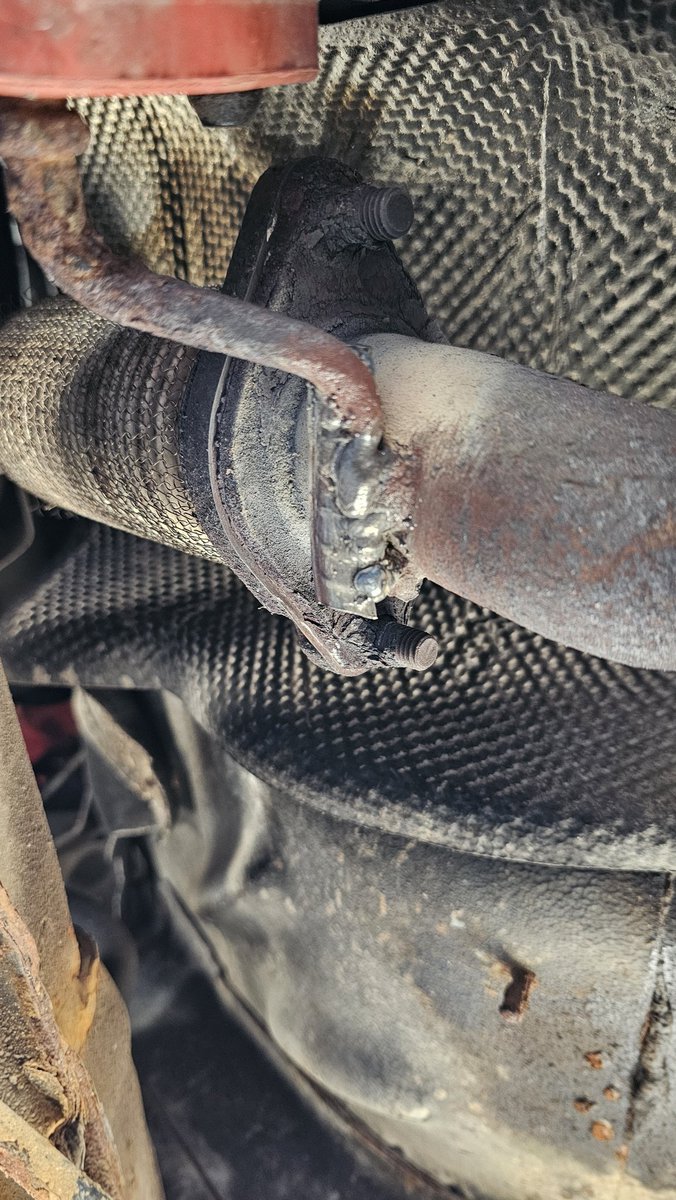 ElectromechYT's tweet photo. Well, used the ol' rebar as structural material trick... That damn rattle of the exhaust resting on the cross member is finally gone! (Don't mind the gasless flux core welder welds... Also I only had ramps to work under there) https://t.co/BibRIXYO3N