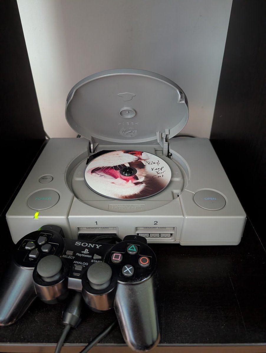 manateefrog's tweet photo. my cd player stopped working. so now my ps1 has a wonderful new use. https://t.co/PJTgfMeBtT