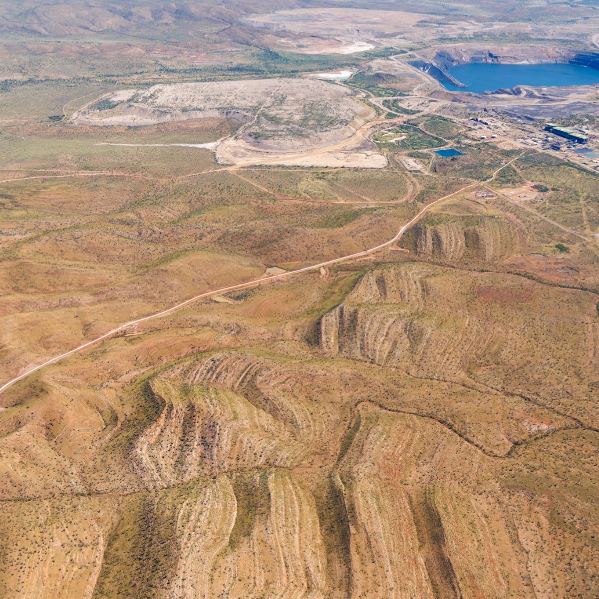 aerometrex's tweet photo. 📍Century Mine, QLD — once Australia’s largest open-pit zinc mine, now its biggest tailings retreatment site. MetroMap aerial imagery helps mining teams track pit progression, monitor rehabilitation, and reduce remote site visits with seamless ArcGIS integration. #AerialImagery https://t.co/qtUQRyCcU1