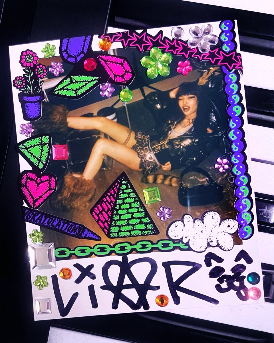 Leannaperry's tweet photo. Lil custom polaroid design for musician and model, Liar 🦴🎀💿 NeonGothTM stickers, rhinestones, and her signature ✏️ https://t.co/gHlA81zZtE