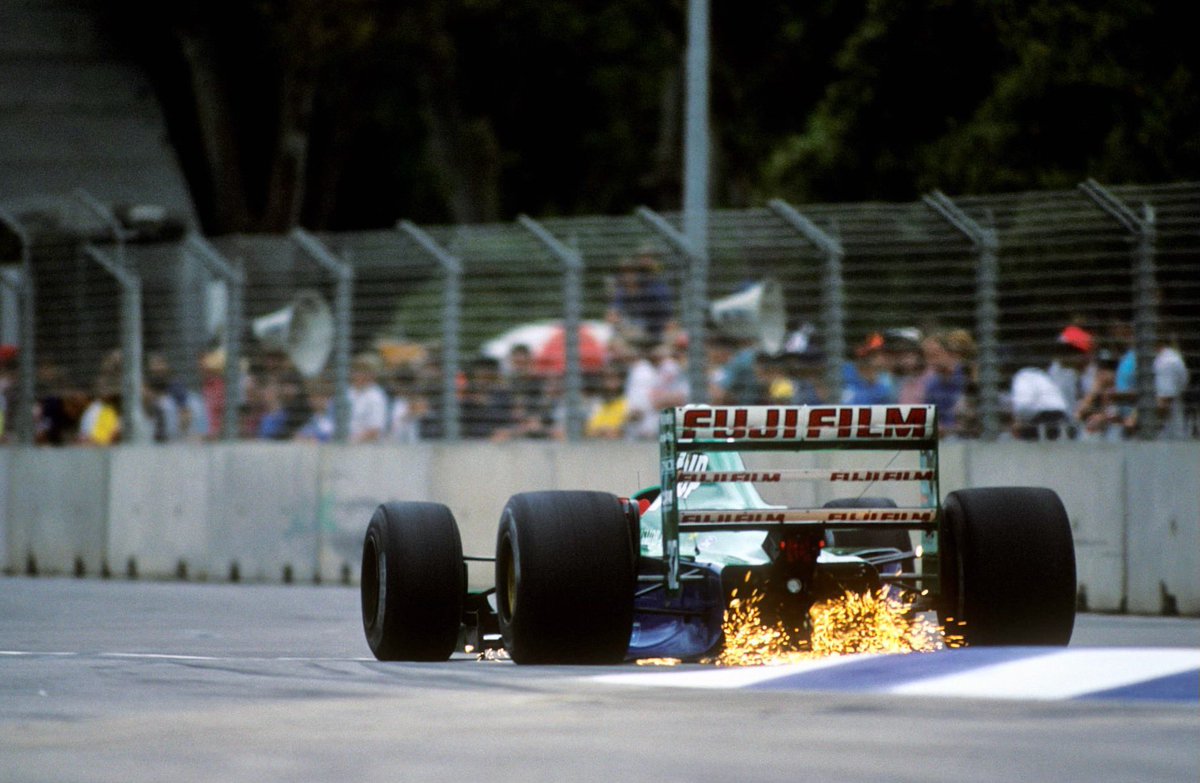 Adelaide_GP's tweet photo. Sparks fly from Alessandro Zanardi's Jordan 191 at the 1991 Adelaide Grand Prix. 

Image from F1. #F1 #Formula1 #Adelaide #AusGP https://t.co/5BFgjqpTqv