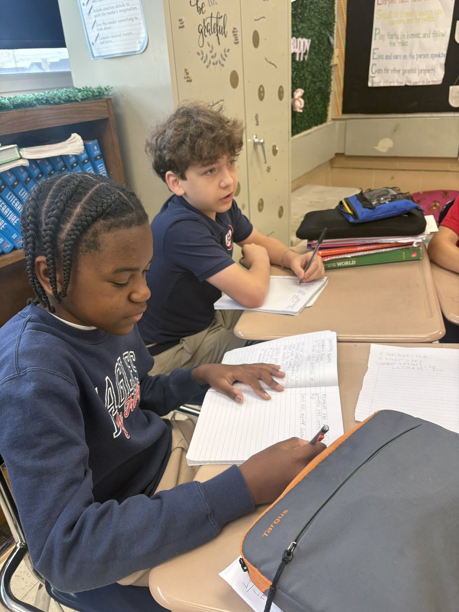 HTSNovak's tweet photo. 7th graders are in prep mode for the Catholic HSPT and public school placement tests by taking notes and practicing analogies. They are learning how to identify relationships between pairs of words and determine how those relationships compare to one another. https://t.co/UMEbapcRVb