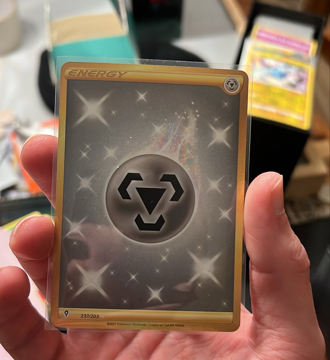 Just found a hollow evolving skies, steel energy that's near mint. This is  like a $12 card. I collect cool energy cards is probably going into my  personal collection lol