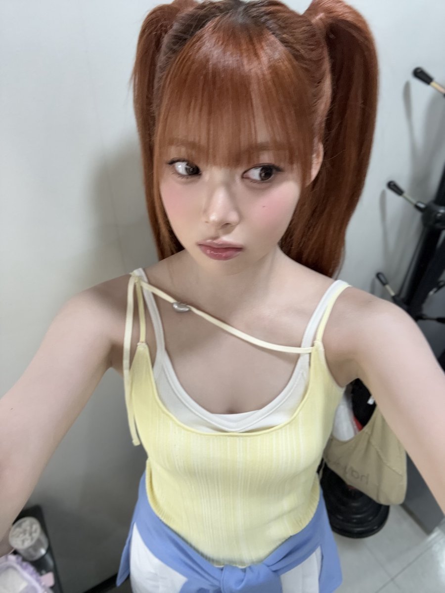 eulnchae's tweet photo. 💭✨ Whole look feels soft but sporty at the same time  layered yellow ribbed camisole over a white inner top, pleated skirt details, oversized blue wrap around the waist, and fluffy wristbands to finish the cute athletic vibe. 🎀 https://t.co/Kfa4UezOFu