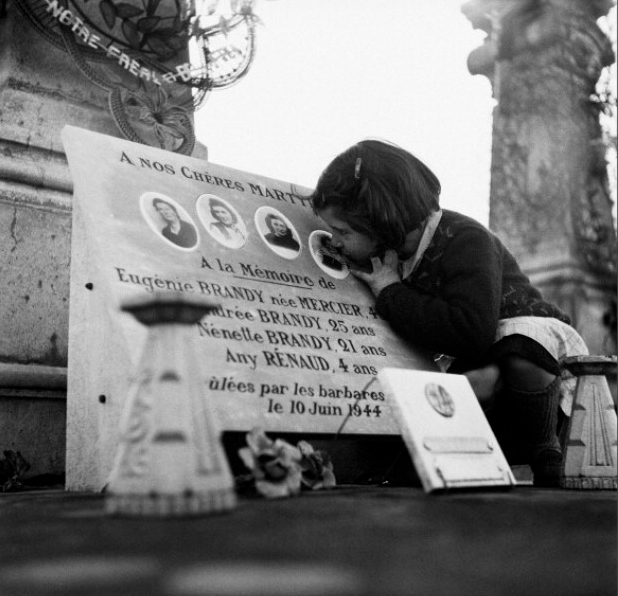 Vanguard_WW2's tweet photo. A decade after the massacre at Oradour-sur-Glane of 10 June 1944, Annette Rénaud places a gentle kiss on the face of a sister that she would never know. https://t.co/8pNRZDVIcD