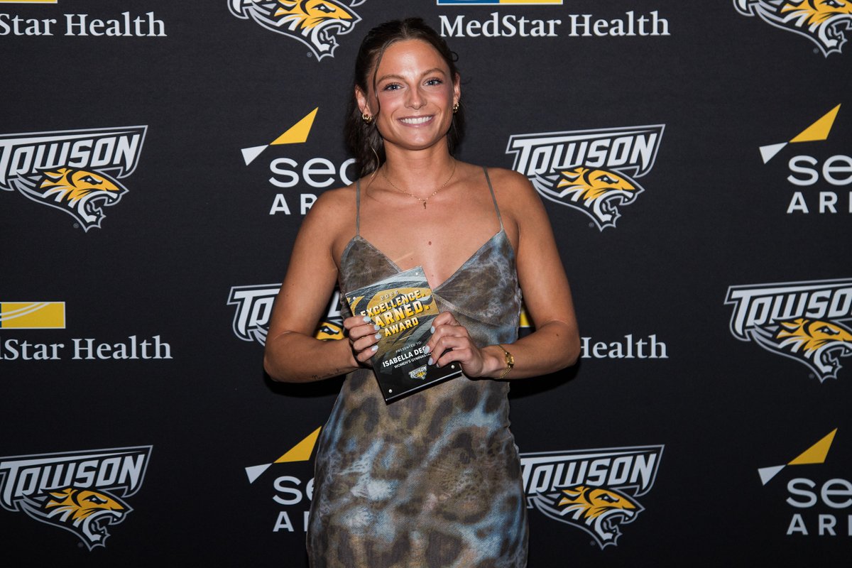 Towson_GYM's tweet photo. Our Golden Paws winners! 🏆
Team - Tiger Cup
Female Senior Career Achievement - Isabella Minervini
Female Rookie of the Year - Jocelyn Lannon
Community Service - Lauren Greene
Excellence Earned - Isabella DeCroo
#GohTigers https://t.co/W2oDRPmtU2